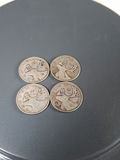 LOT OF FOUR CANADIAN SILVER QUARTERS from The 1930s - thumbnail 2 of 3