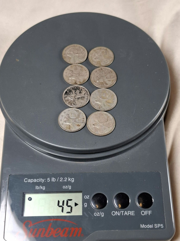 Eight CANADIAN SILVER QUARTERS from The 50s ($2 In Face Value) - image 1 of 6