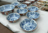 Assorted Asian-style ceramic bowls, decorative boxes, plates, and a round wooden box - thumbnail 2 of 10