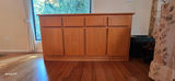 Wooden kitchen island with drawers and cabinet doors - thumbnail 2 of 4