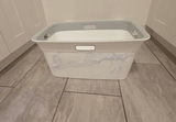 Assorted woven baskets and marble-pattern laundry hamper - thumbnail 1 of 7