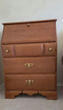 Tall wooden dresser with lift-top desk and brass hardware - thumbnail 1 of 2