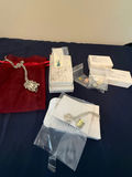 Silver-tone jewelry set with turquoise pendant, bracelet, and assorted charms - thumbnail 1 of 6