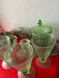 Green glassware collection with lidded dish and metal basket - thumbnail 3 of 5