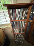CD collection on wooden shelf - thumbnail 2 of 5