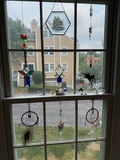Assorted decorative hanging ornaments - thumbnail 1 of 16