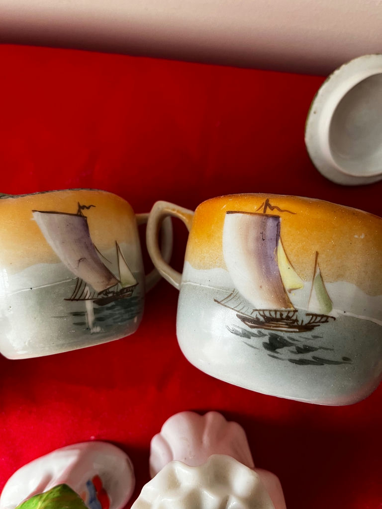 Assorted Ceramic Figurines and Sailboat Mugs - image 5 of 5