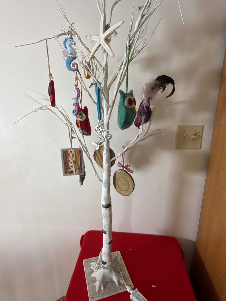 White decorative tree with assorted hanging ornaments - image 1 of 2