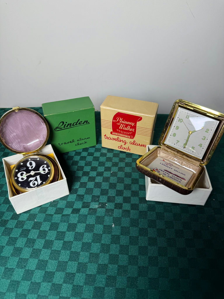 Vintage travel alarm clocks with boxes and case - image 1 of 6
