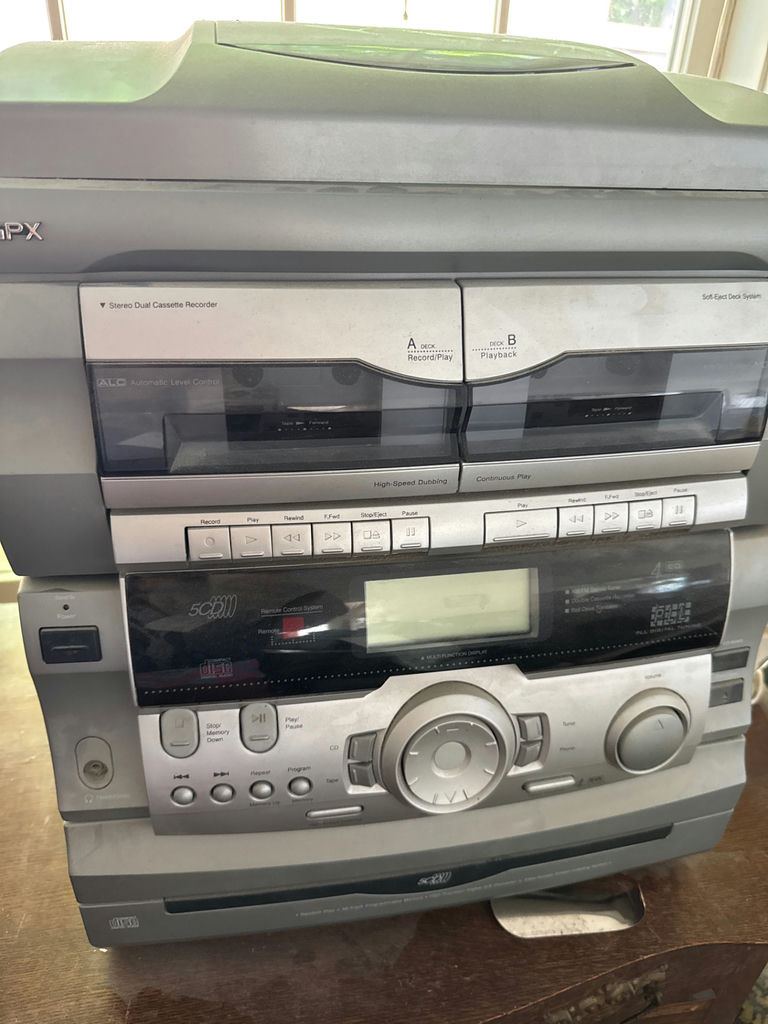 Vintage multi-component stereo with dual cassette decks and speakers - image 1 of 3