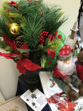 Christmas greenery arrangement with plush Santa and reindeer and decorative church - thumbnail 4 of 4