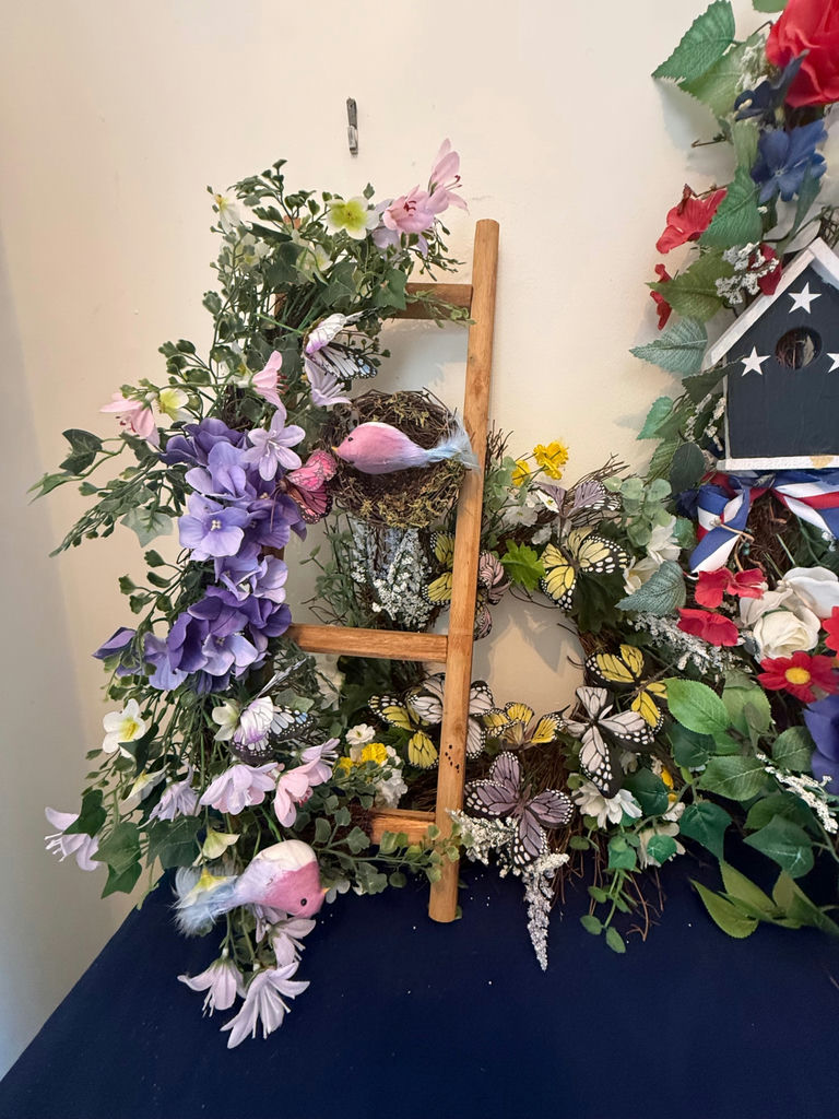 Multiple floral wreaths with birdhouse and ladder - image 2 of 4