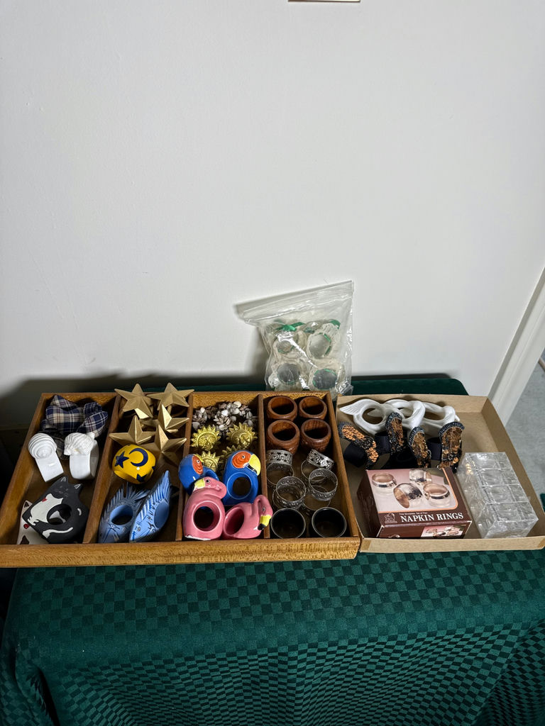 Assorted napkin rings and decorative trinkets - image 1 of 8