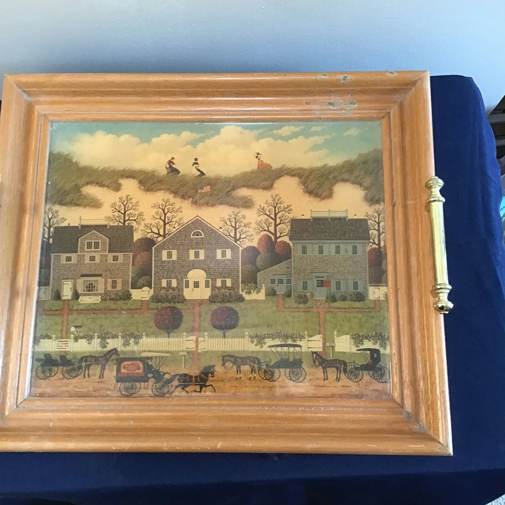 Framed folk-art print of houses and horse-drawn carriages 16x13.5 - image 1 of 2