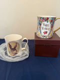 Two ceramic mugs: floral 'Happy Birthday' mug and rabbit portrait mug - thumbnail 1 of 3