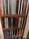 Tall wooden CD storage tower with stacked CD cases - thumbnail 5 of 5