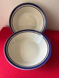 Blue-rimmed hand-painted ceramic plates - thumbnail 1 of 3