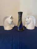 Pair of horse head ceramic busts with a tall glazed vase - thumbnail 1 of 5