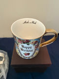 Two ceramic mugs: floral 'Happy Birthday' mug and rabbit portrait mug - thumbnail 2 of 3