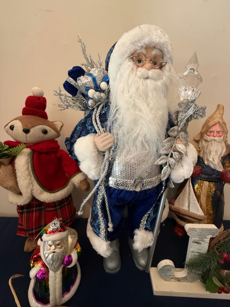Deck the Halls holiday display with Santa figures and surroundings - image 3 of 5