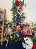 Multiple floral wreaths with birdhouse and ladder - thumbnail 1 of 4