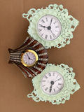 Three ornate decorative clocks - thumbnail 1 of 5