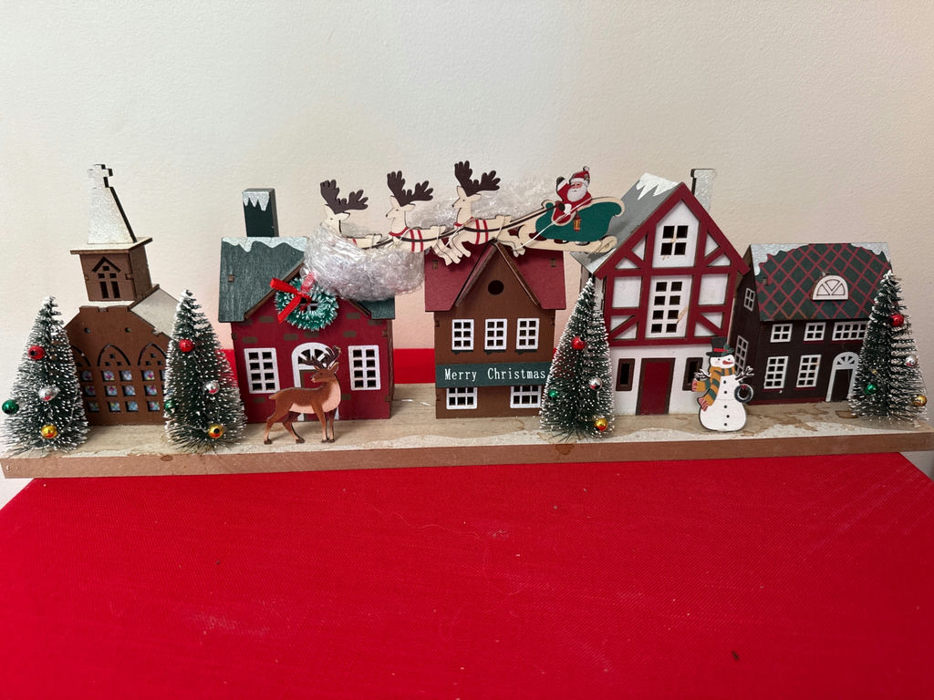 New in box - Christmas village with houses, trees, and holiday figures - image 1 of 2