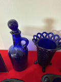 Cobalt blue and blue glassware collection with decorative sculpture - thumbnail 4 of 4