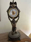 Atlas Titan Bronze clock held aloft by muscular statue - thumbnail 1 of 3