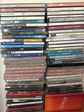 Tall wooden CD storage tower with stacked CD cases - thumbnail 3 of 5