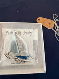 Assorted fashion jewelry: sailboat pendant, dragonfly brooch, and shell charms - thumbnail 2 of 4