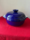Blue Emile Henry lidded casserole with white ceramic dish - thumbnail 1 of 4