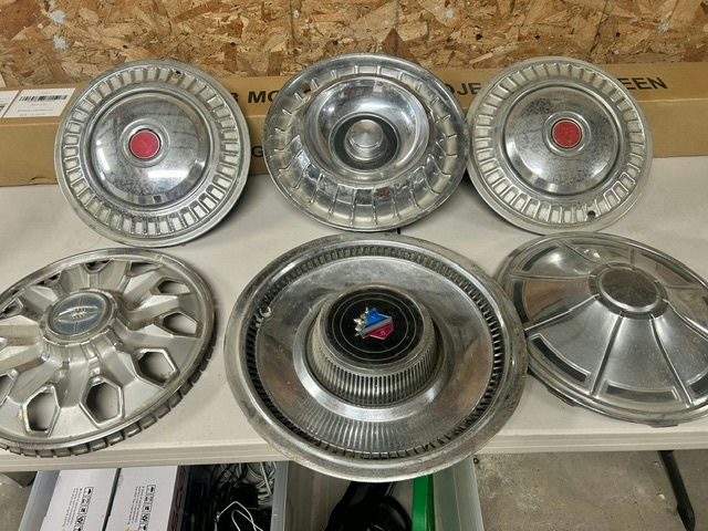 Ambassador car hubcaps and grille pieces - image 1 of 11