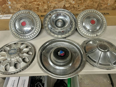 Ambassador car hubcaps and grille pieces - Image 1 of 11