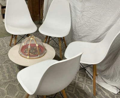 4 White Plastic Eiffel Chairs, Round Low Table - Image 1 of 7