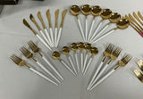 Gold-tone flatware set with white and pink handles and wooden-handled utensils - thumbnail 5 of 10
