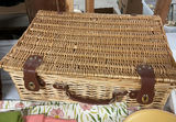 Wicker picnic baskets with blue floral and yellow dinnerware, glassware, and linens - thumbnail 7 of 12