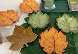 Leaf-themed home decor set with ceramic leaf plates, leaf placemats, moss, and plaid table runner - thumbnail 2 of 6
