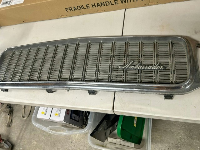 Ambassador car hubcaps and grille pieces - image 6 of 11