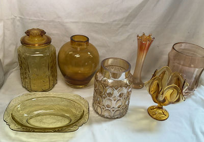 Assorted vintage amber and pink glassware: vases, jars, and plate - Image 1 of 4