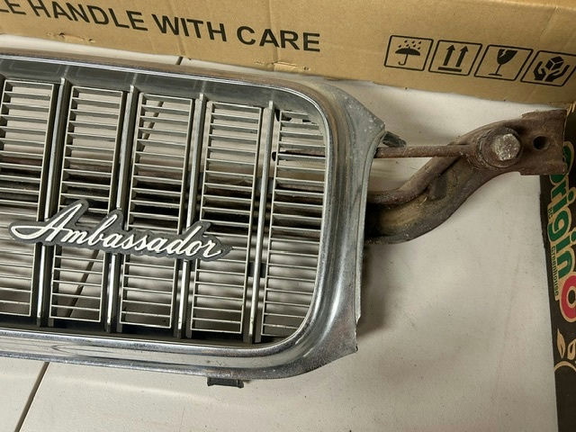 Ambassador car hubcaps and grille pieces - image 10 of 11