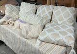 Beige decorative pillows and matching throws - thumbnail 1 of 6