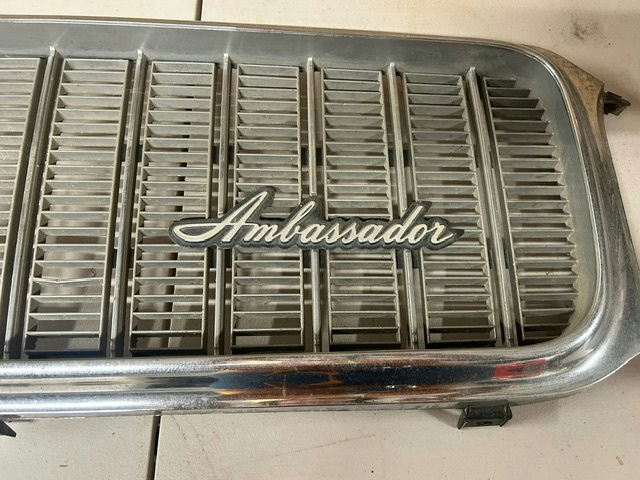 Ambassador car hubcaps and grille pieces - image 7 of 11