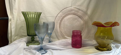 Green hurricane vase, blue ribbed goblets, pink textured jar, amber vase with red rim, and silver plate - Image 1 of 5