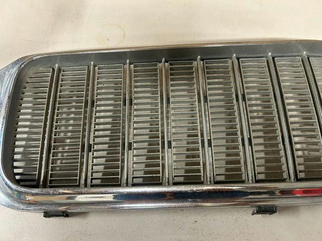 Ambassador car hubcaps and grille pieces - image 8 of 11