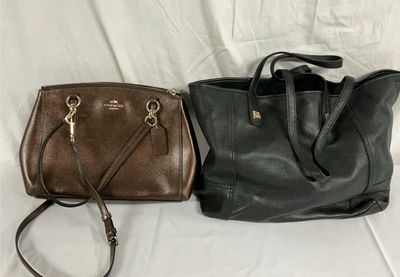 Brown metallic Coach crossbody bag and black leather tote - Image 1 of 6