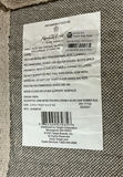 Woven throw blanket, straw basket with tassels, grey cushions, and tassel rug - thumbnail 6 of 8
