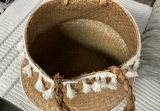 Woven throw blanket, straw basket with tassels, grey cushions, and tassel rug - thumbnail 3 of 8
