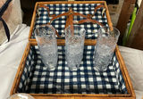 Wicker picnic baskets with blue floral and yellow dinnerware, glassware, and linens - thumbnail 4 of 12