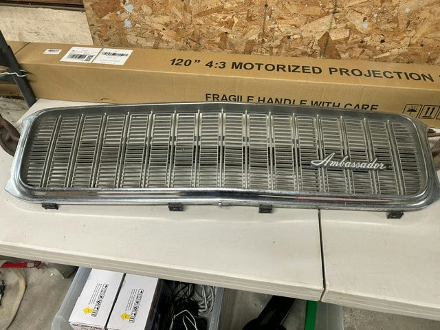 Ambassador car hubcaps and grille pieces - image 9 of 11